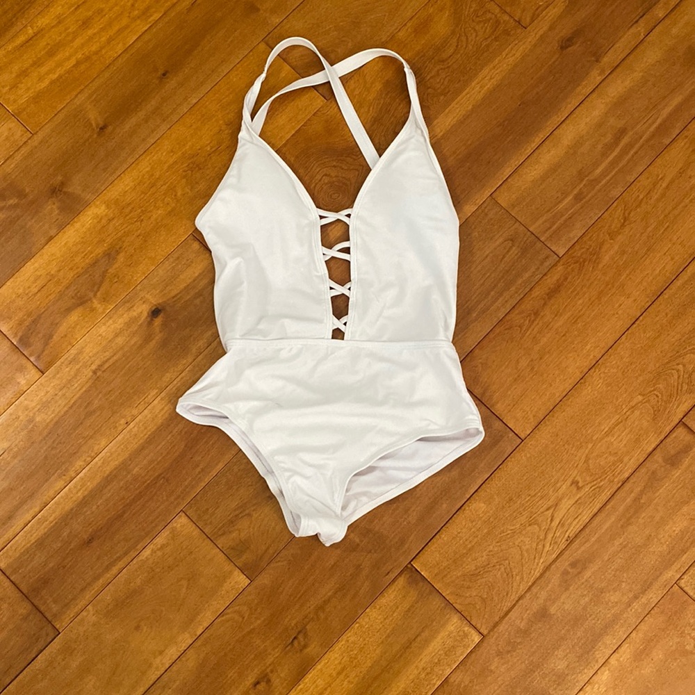 Cross back white cheeky one piece